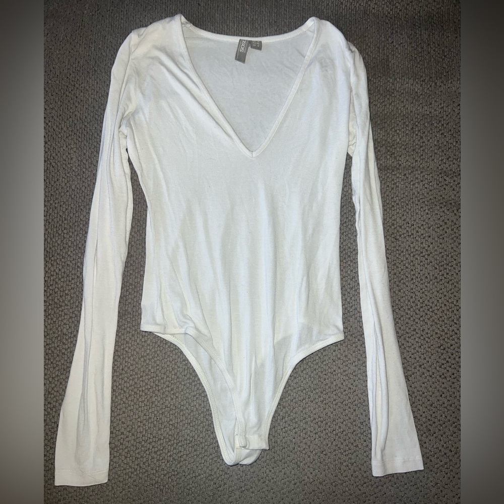 White Long sleeved size 0 Body suit from asos